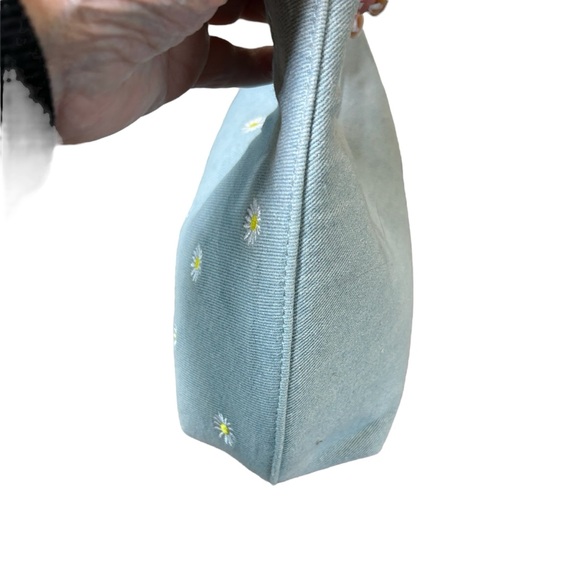 Skinny Dip of London light blue denim shoulder bag with daisies. - Picture 5 of 7